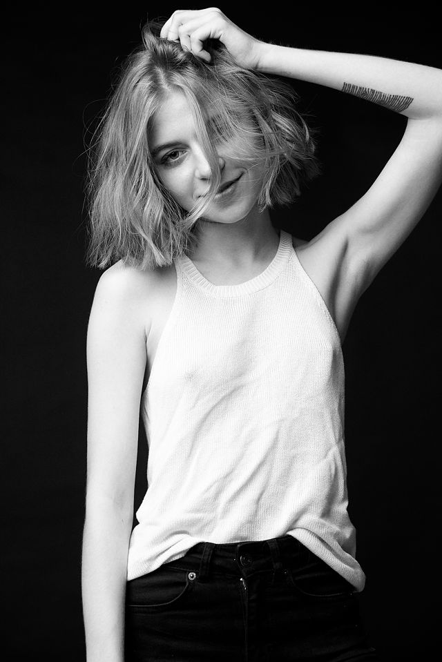 Anna low-key portrait. Theatrical shadow, soft side light.