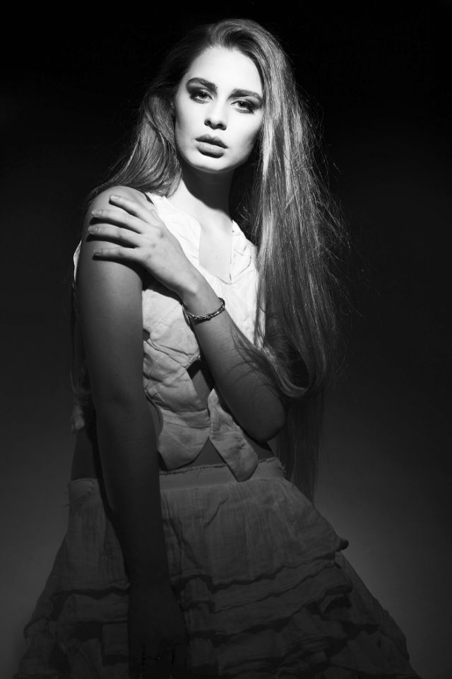 Sasha studio portrait. One beam, deep shadows